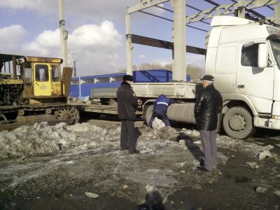 В Кузбассе у компании по ремонту дорог за долги по зарплате арестовали спецтехнику